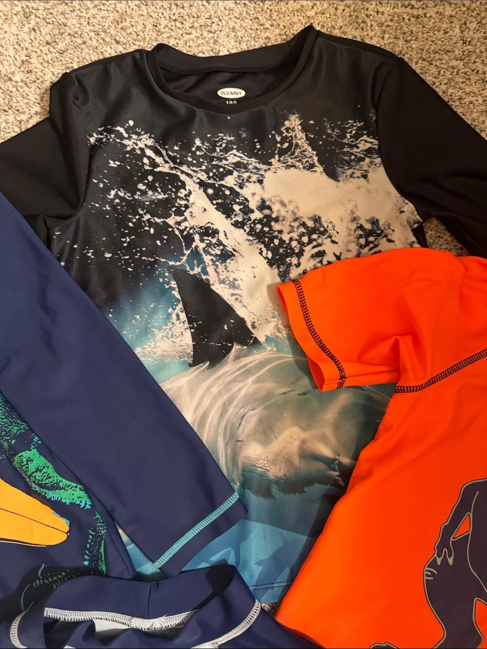 Bundle of 4 boys swim shirts